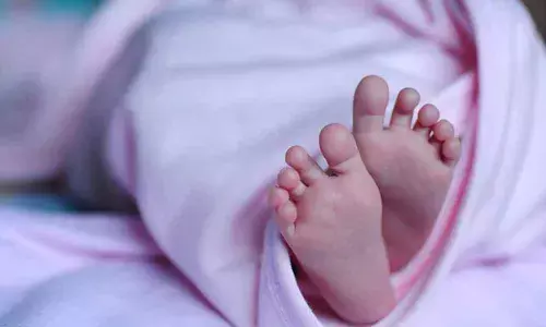 Mother dumps six month old son into drainage over dispute with husband in Vijayawada