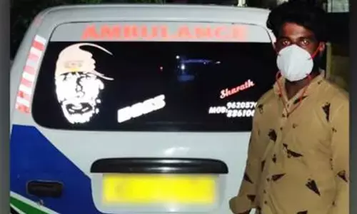 Ambulance driver dumps body on road, held