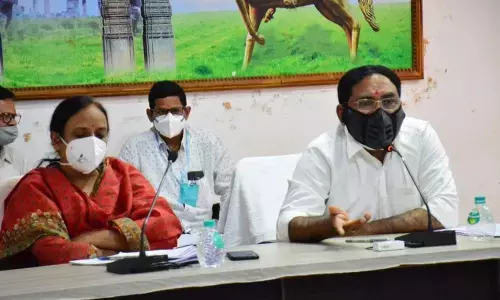 Minister for Panchayat Raj Errabelli Dayakar Rao speaking at a review meeting in Warangal on Friday.  Rural Collector  M Haritha is also seen