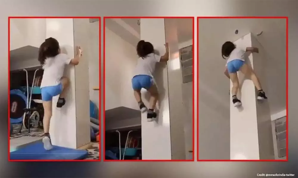 Watch The Trending Video Of A 7 Year-Old-Boy Successfully Climbing The Pillar