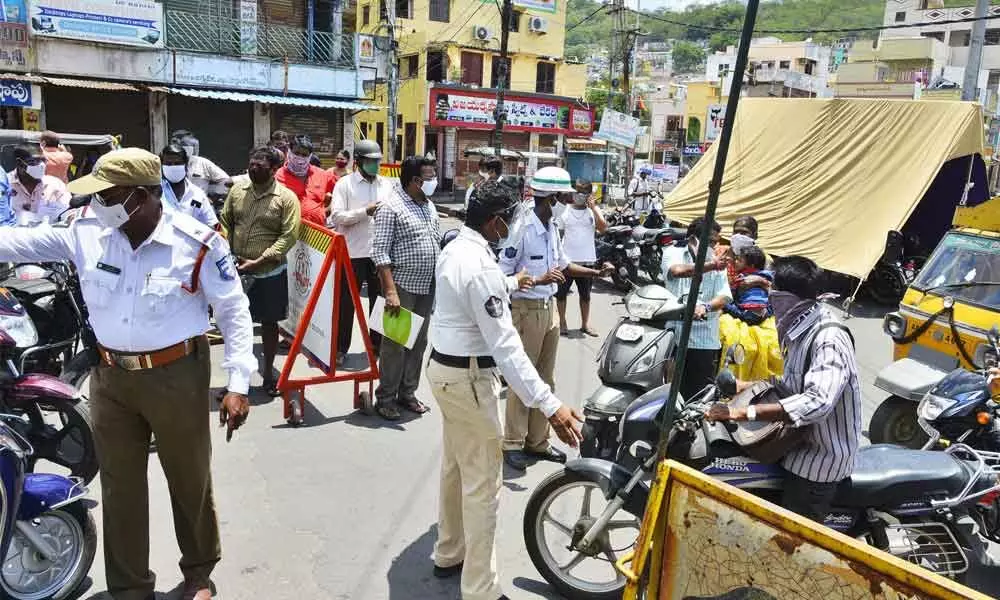 Barricades being set up by the police in One Town in Vijayawada as the period of relaxation ends during the day 	Photo: Ch V Mastan