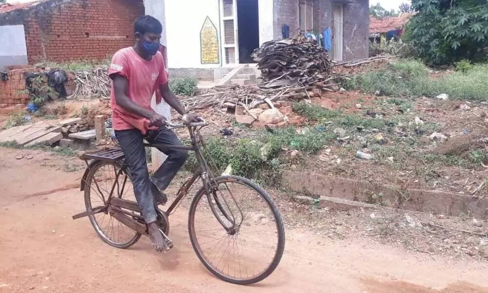 Labourer rides 300 kms to fetch medicine to son