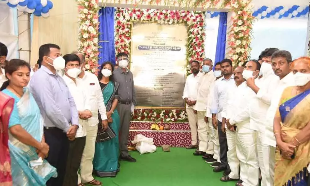 Ministers K Narayana Swamy, P Ramachandra Reddy, Collector M Hari Narayanan, MLAs, MPS and officials at the plaque of the ground breaking ceremony for medical college in Madanapalle on Monday.