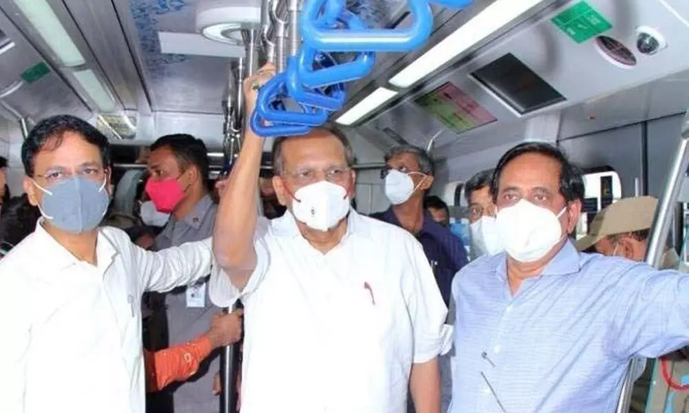 Chief Secretary Somesh Kumar travels in metro from Khairatabad  to Ameerpet
