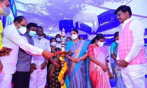 Roads & Buildings Minister M Sankara Narayana lighting the lamp to mark the occasion of Chief Minister Y S Jagan Mohan Reddy laying foundation stone for medical college in Penukonda on Monday. MP Gorantla Madhav is also seen