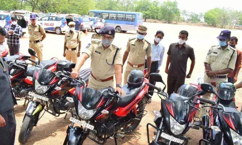 ASP P Ram Reddy inspecting two-wheelers of police officials in Nirmal on Monday