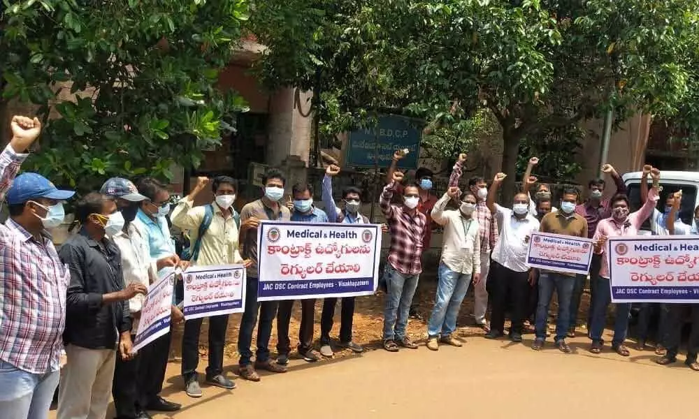 Paramedical contract employees staging a protest in Visakhapatnam on Tuesday