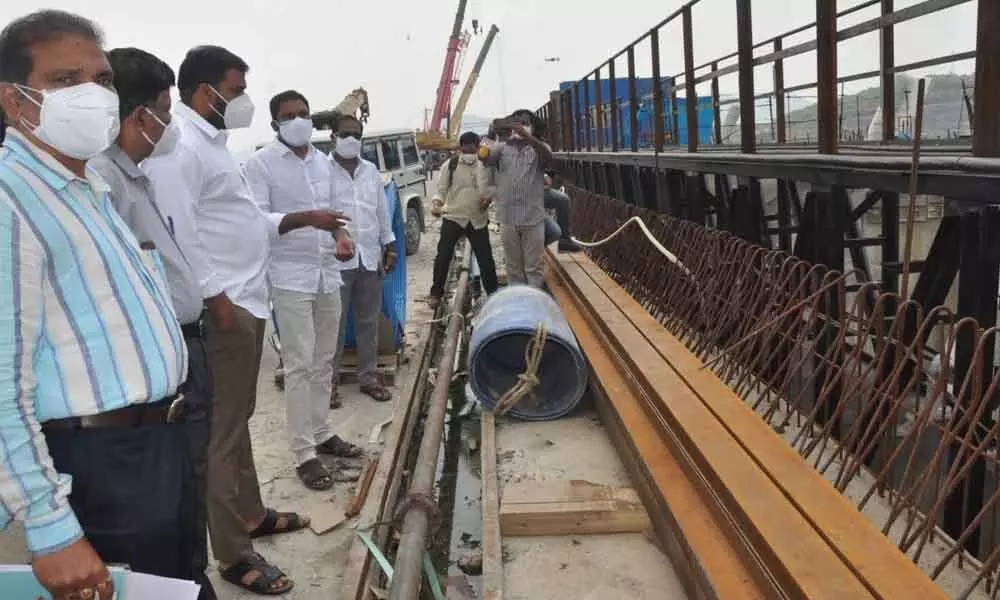 Minister for Irrigation P Anil Kumar Yadav and other officials inspecting Polavaram project construction  works on Wednesday
