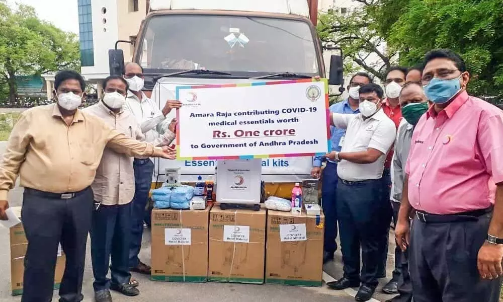 Representatives of Amara Raja Industries handing over Rs one crore worth Covid medical items to joint collector (welfare) Rajasekhar (welfare) in Chittoor on Thursday