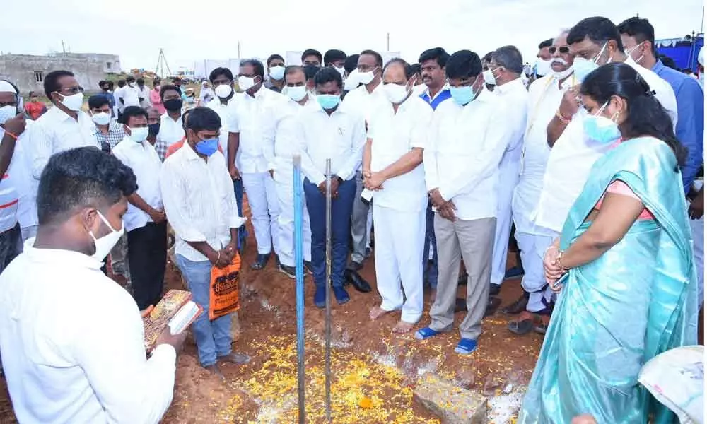 Minister for Roads and Buildings Sankara Narayana participating in bhoomi puja at a YSR Housing colony in Anantapur on Friday