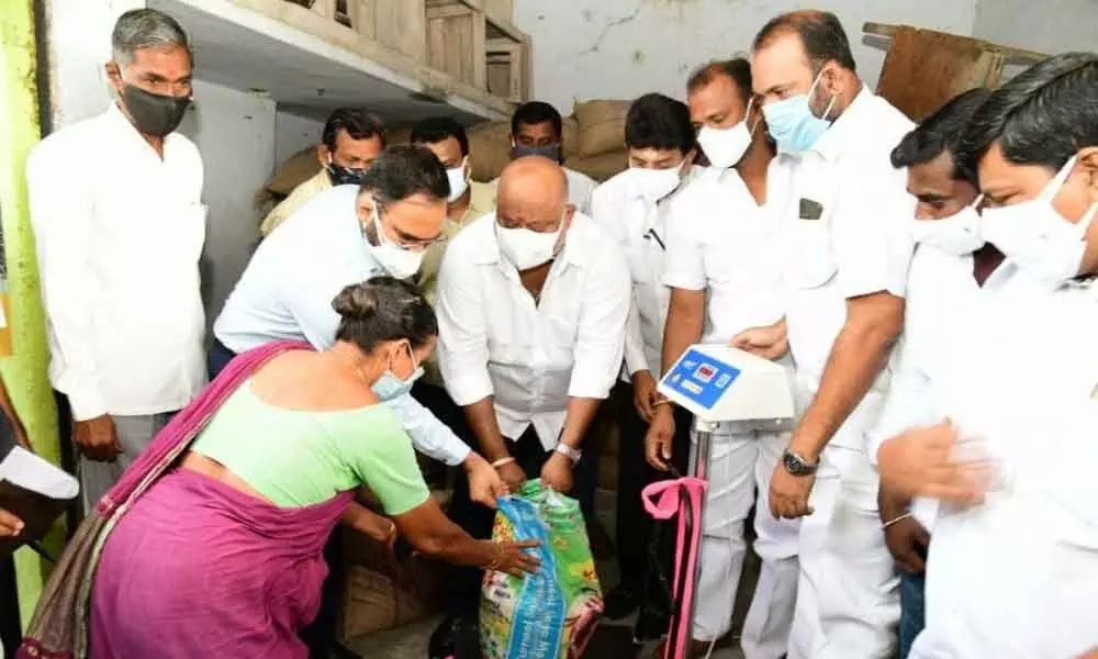 Minister G Kamalakar launched free distribution of rice to poor families in Karimnagar on Saturday