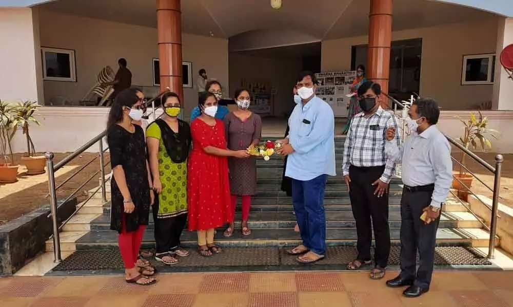 SBIT College Chairman RJC Krishna with students who got the jobs in Infosys in Khammam on Saturday