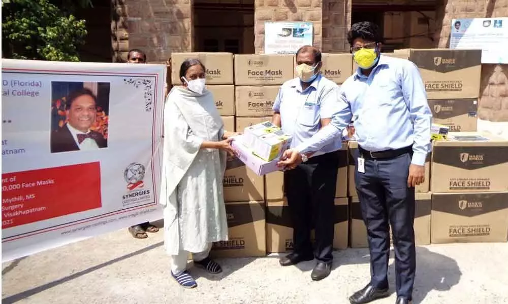As a part of its CSR initiative, representatives of Synergies Castings Ltd handing over face shields and masks to the Superintendent of King George Hospital in Visakhapatnam