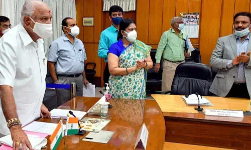 Chief Minister B S Yeddiyurappa during the launch of Covid relief assistance for building and other construction workers in Bengaluru on Saturday