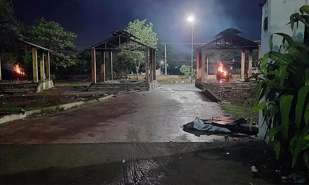 Much against Hindu traditions, final rites performed in the night at a burial ground in Visakhapatnam.