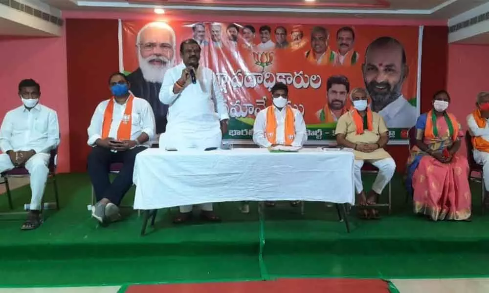 BJP leader G Premender Reddy addressing party workers in Karimnagar on Tuesday