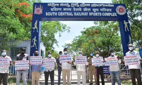 Several public associations stage a silent protest in front of the RRC ground on Tuesday	Photo: Adula Krishna