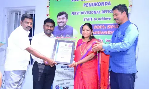 Anantapur Collector  Gandham  Chandrudu felicitating Penukonda Sub-Collector  T Nishanthi  (File photo)