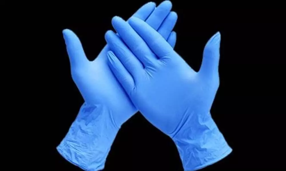 Malaysian glove maker logs huge pandemic profit despite ban