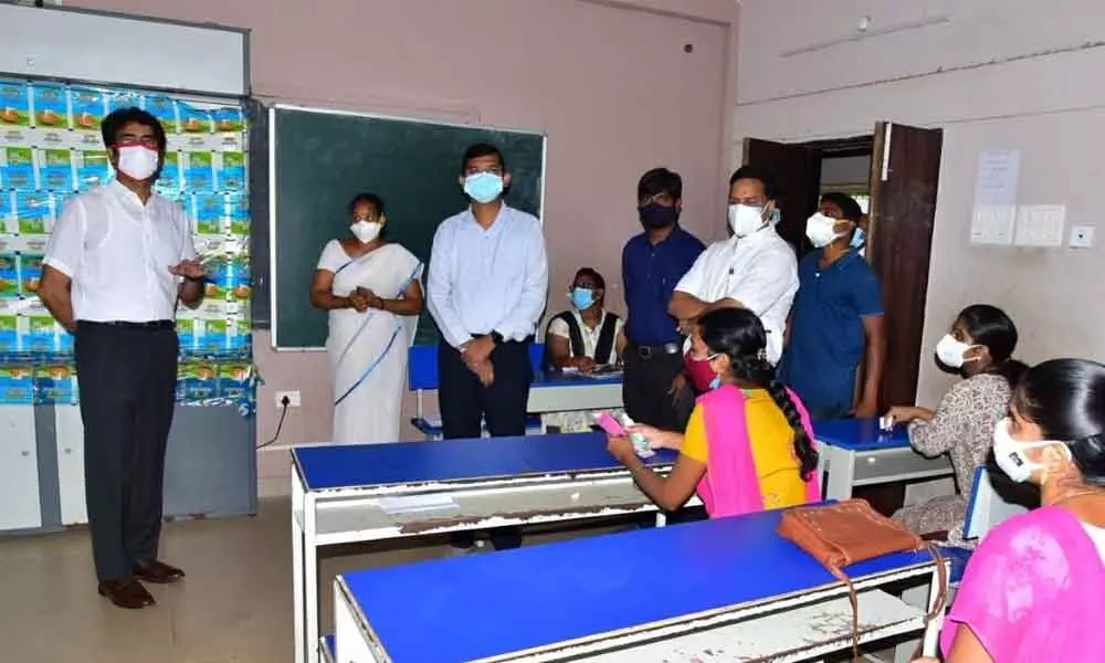 Collector D Muralidhar Reddy inspecting vaccination centre in Kakinada on Thursday