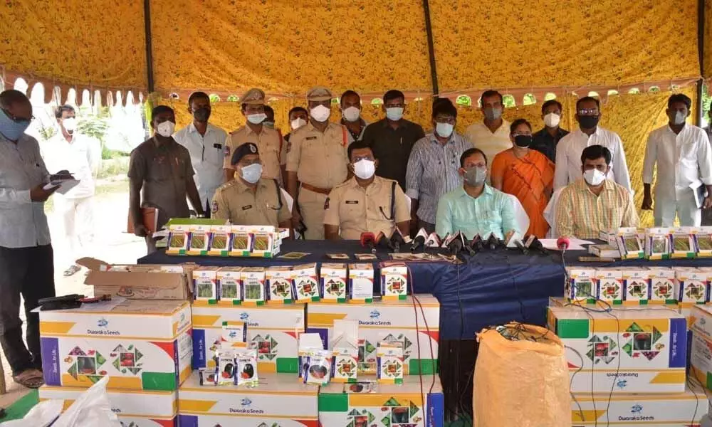 District SP Bhaskaran along with District Collector T Vinay Krishna Reddy briefing the media about fake seeds racket at a press meet in Suryapet on Thursday