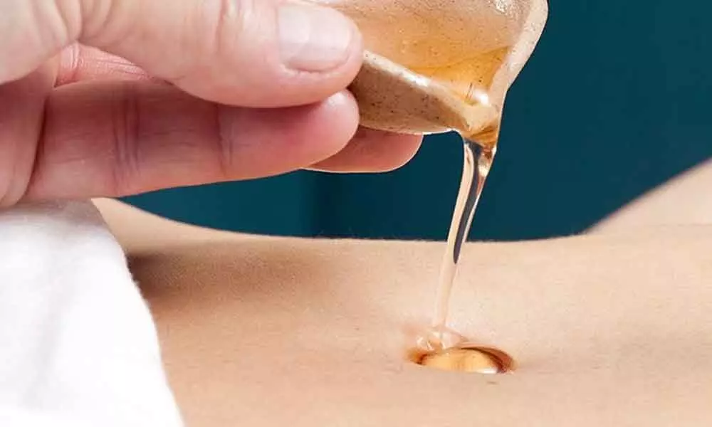 Navel oiling helps to detoxify the body