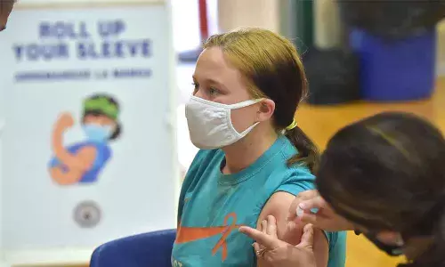 Hong Kong opens vaccine drive to children aged 12 and older