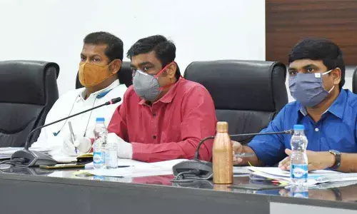 Collector J Nivas addressing the Covid management meeting in Vijayawada on Thursday