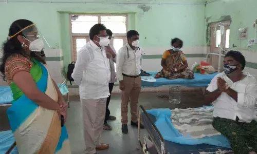 ZP Chairman L Kamal Raj interacting with Covid patients at Covid ward in Government Hospital in Madhira on Friday
