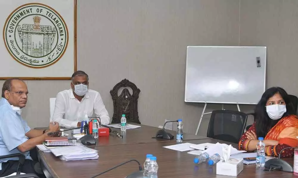 Finance Minister T Harish Rao, along with Chief Secretary Somesh Kumar and others, attending the GST council meeting held virtually on Saturday