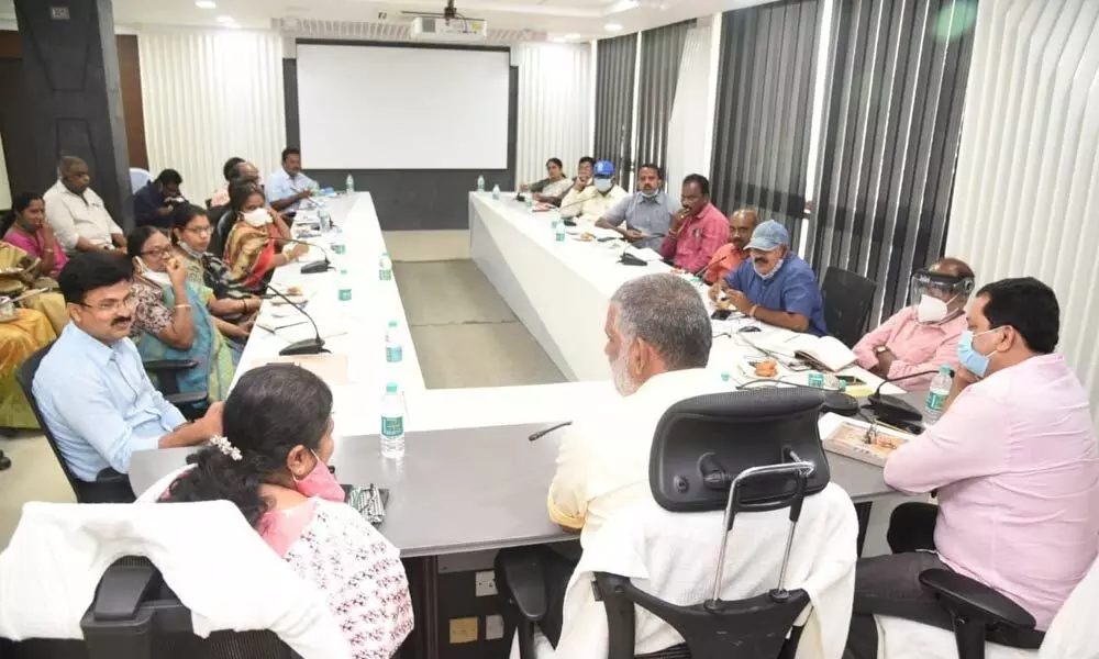 MLA Chevireddy Bhaskar Reddy conducting a review meeting with officials at TUDA office in Tirupati on Saturday