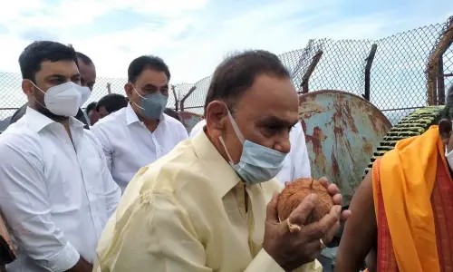 Mydukuru MLA S Raghurami Reddy releasing water from Brahma Sagar Dam after performing puja in B Matam on Saturday.