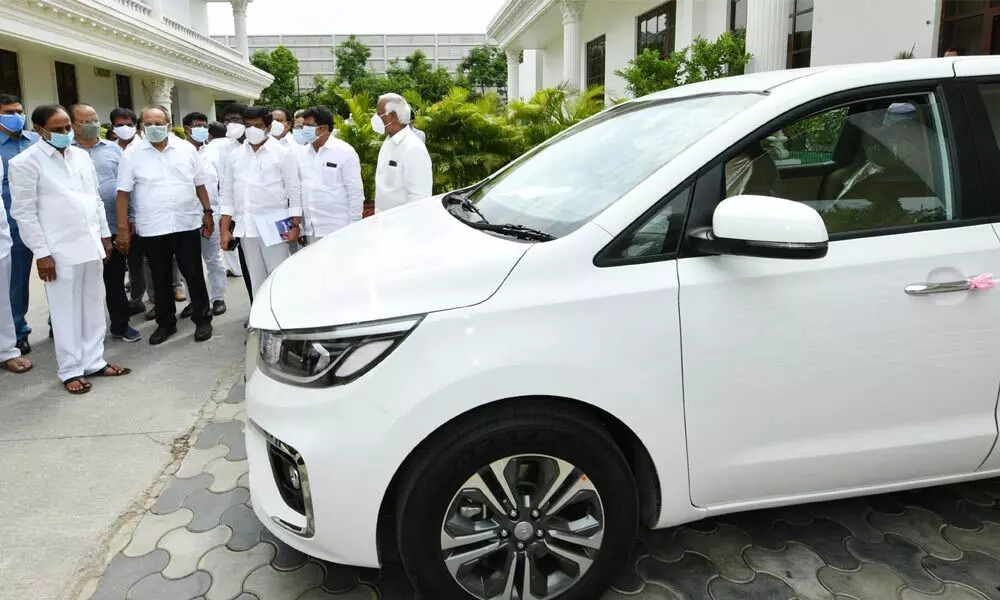 Chief Minister KCR having a look at the luxury cars being given to Additional Collectors at Pragathi Bhavan in Hyderabad on Sunday