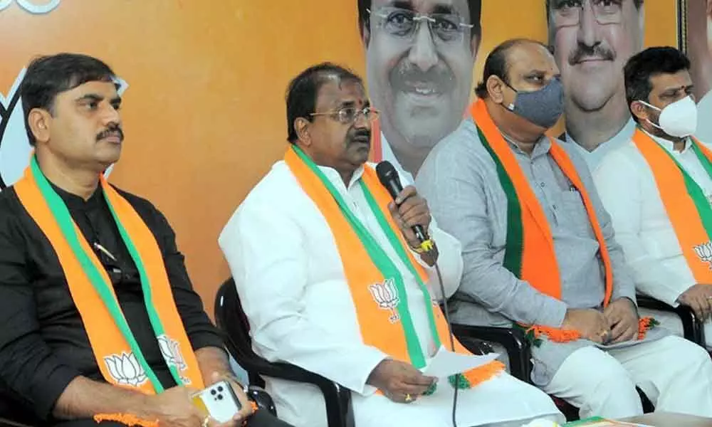 BJP State president Somu Veerraju along with other party leaders addressing the media at party office in Vijayawada on Monday