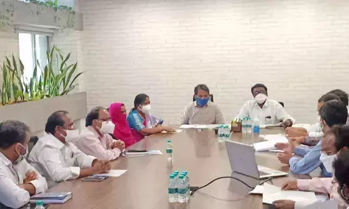 MAUD Principal Secretary Arvind Kumar and Transport Minister P Ajay Kumar at a review meeting on the development of Khammam Municipal Corporation in Hyderabad on Monday