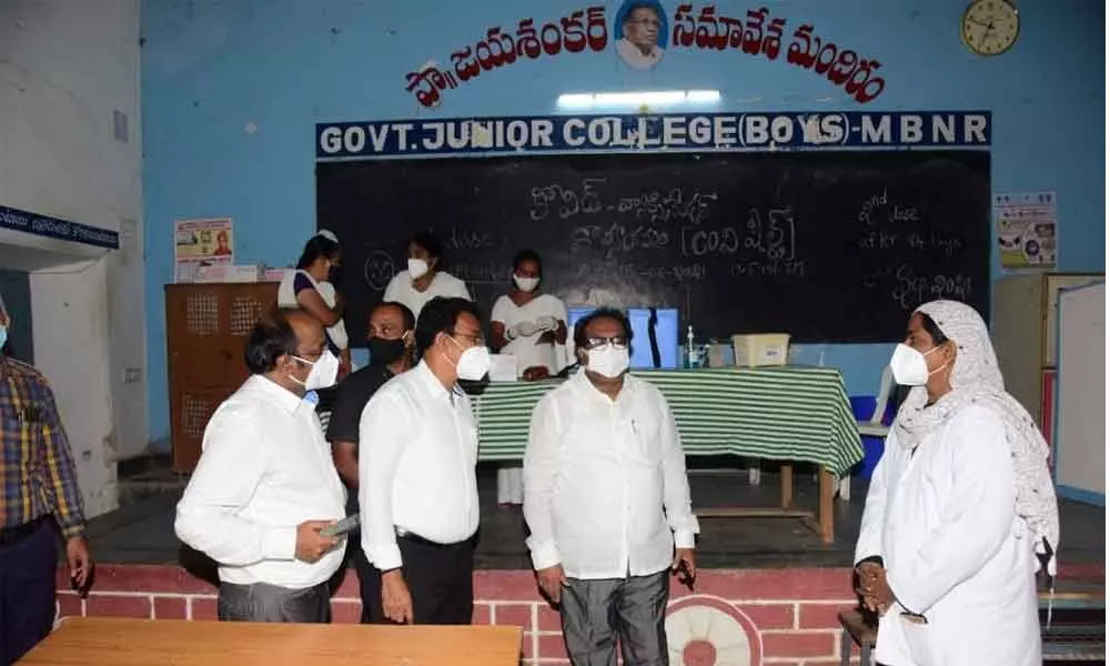 District Collector S Venkat Rao inspecting vaccination centre at Boys Government Junior College in Mahbubnagar on Tuesday