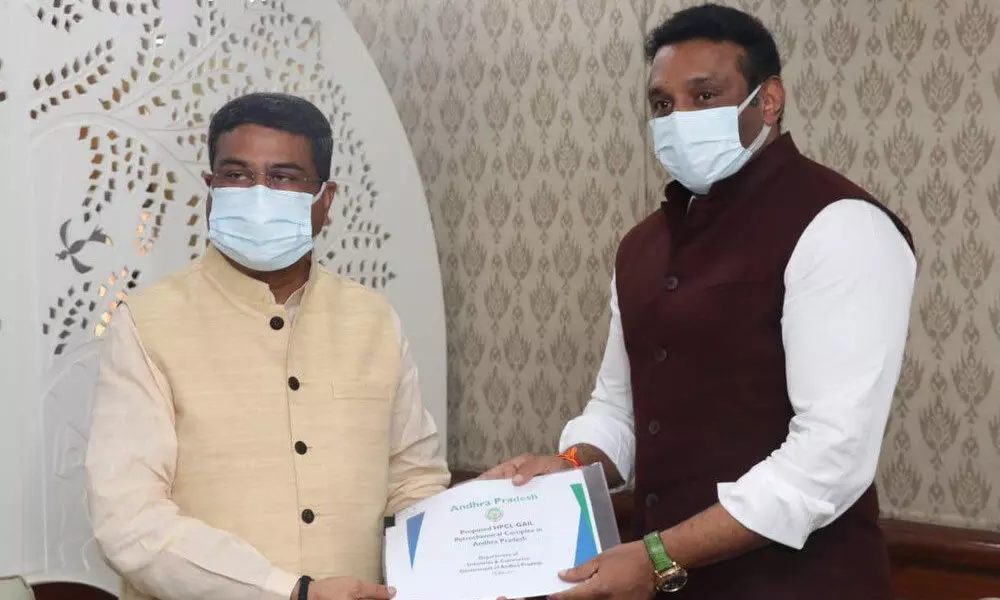 State IT and Industries Minister Mekapati Goutham Reddy submits petro-chemical project report to Union Petroleum Minister Dharmendra Pradhan in New Delhi  on Wednesday