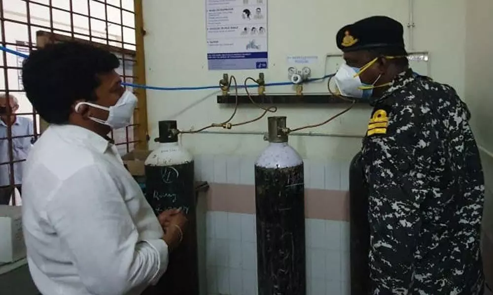 A Naval officer (right) explaining the functioning of oxygen plant at Palasa to Minister for Animal Husbandry S Appala Raju (file photo)