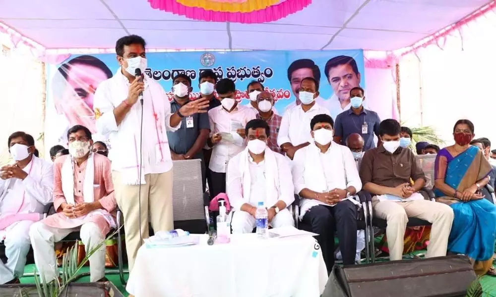 Minister KT Rama Rao addressing a gathering at Sircilla on Wednesday