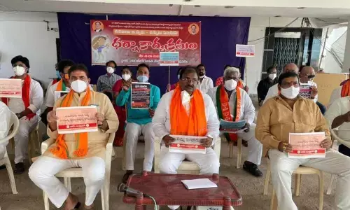 BJP State president Somu Veerraju along with party leaders stages a protest against property tax hike, in Rajamahendravaram on Wednesday