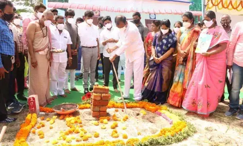 MLA Bhumana Karunakar Reddy, MP Gurumoorthy and other officials participating in Bhumi Puja for the construction of houses for the poor at G Palem village in Renigunat mandal on Wednesday