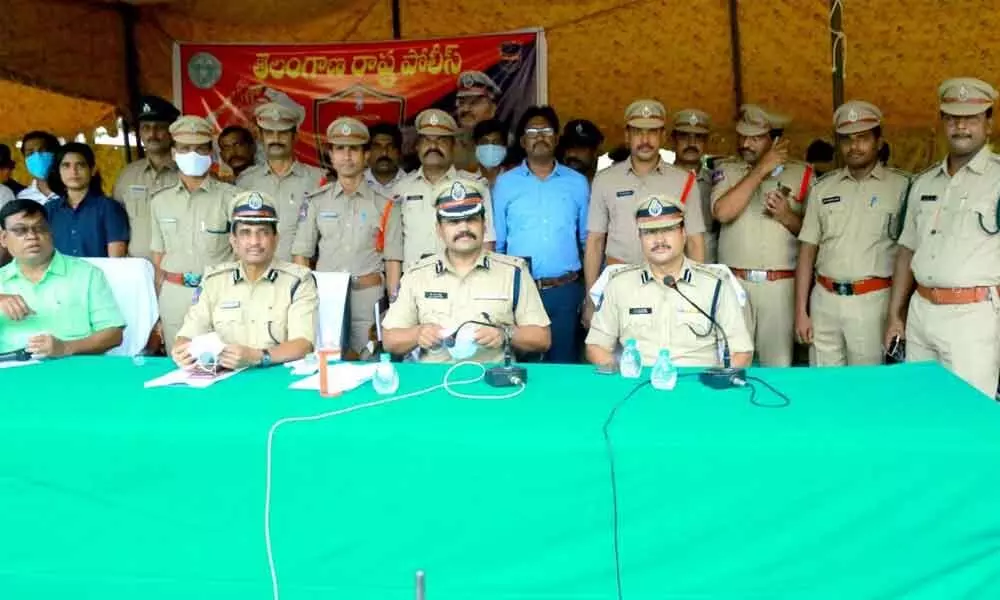 District SP AV Ranganath along with top cops Stephen Ravindra and Shiva Shankar Reddy, briefing the media about spurious seeds racket at a press meet at DPO office in Nalgonda on Friday