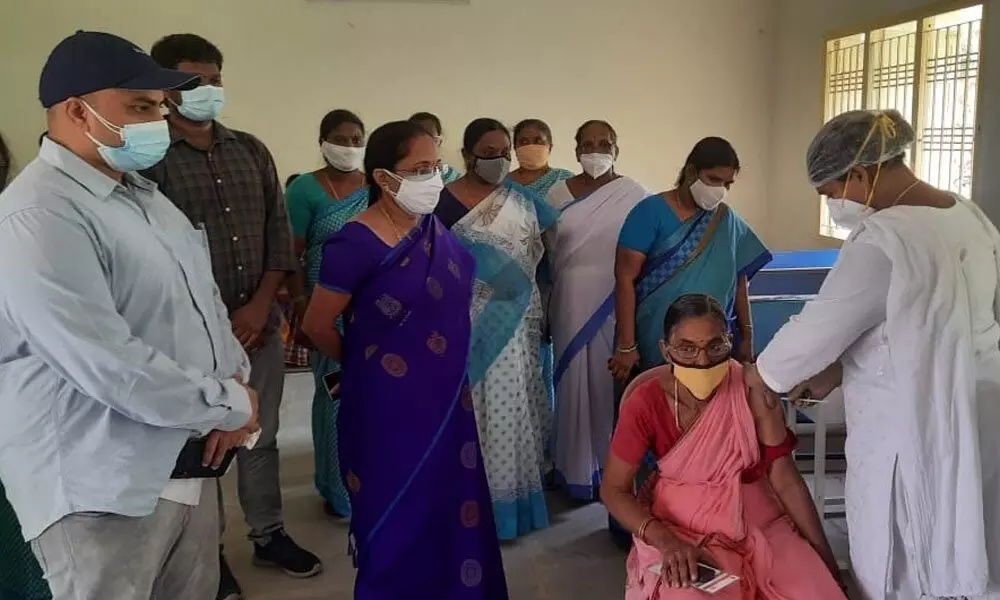 Covid vaccine being administered at a centre at Nidamanuru in Vijayawada rural mandal on Sunday