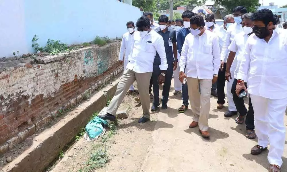 Minister Ajay Kumar inspecting sanitation works in Pandilapalli village on Monday