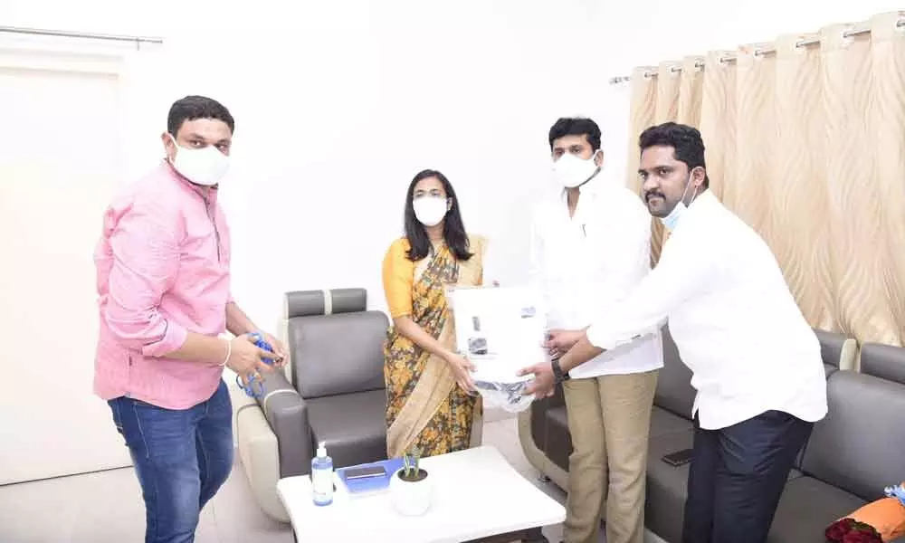 Raptadu MLA Topudurthi Prakash Reddy handing over oxygen concentrators to Collector Nagalakshmi Selvarajan in Anantapur on Monday