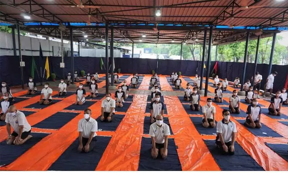 Naval personnel of ENC taking part in yoga on the occasion of the International Day of Yoga in Visakhapatnam on Monday