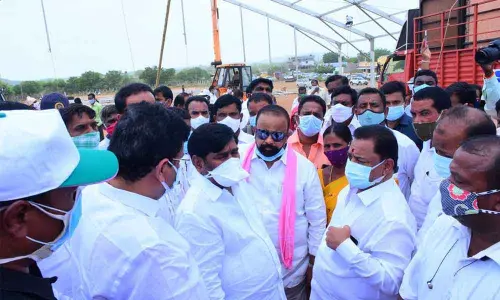 Energy Minister G Jagadish Reddy along with DCCB Chairman Gongidi Mahender Reddy and TSIIC Chairman Bala Mallu on Monday inspecting CM KCRs public meeting venue in Vasalamarri
