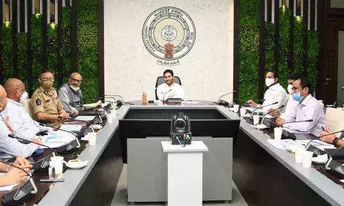 Chief Minister Y S Jagan Mohan Reddy reviews steps to control Covid-19, vaccination drive and Nadu Nedu in Health Department in Tadepalli on Monday