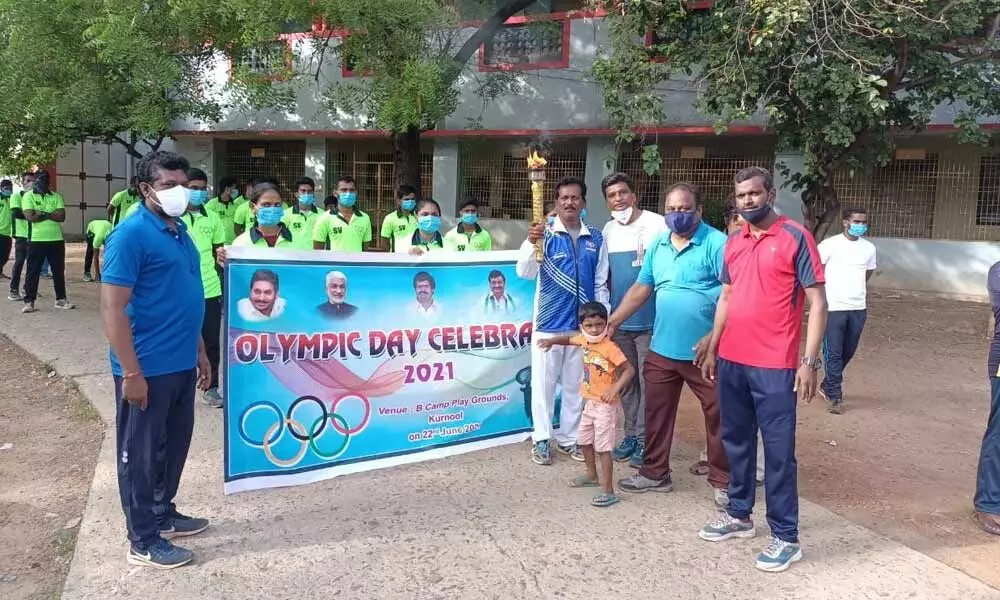 Participants at Olympic Run in Kurnool on Tuesday