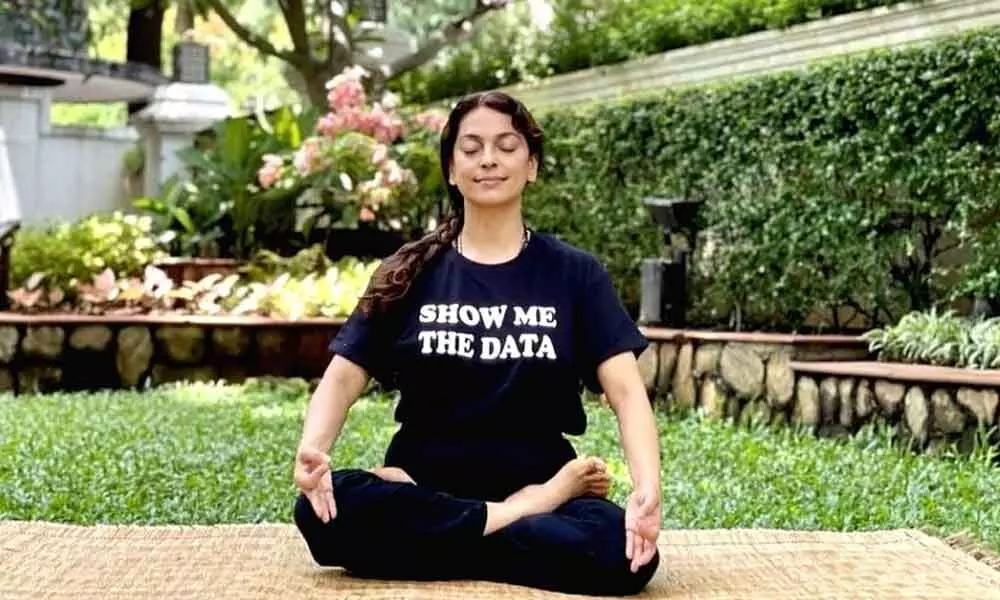 Juhi Chawla wears T-shirt with slogan show me the data